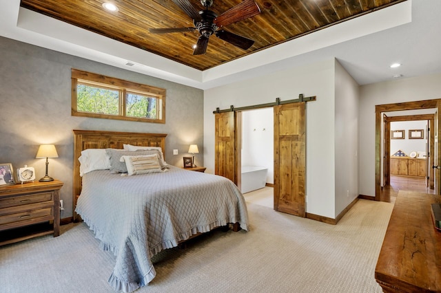 carpeted bedroom featuring a barn door, baseboards, wooden ceiling, a raised ceiling, and recessed lighting