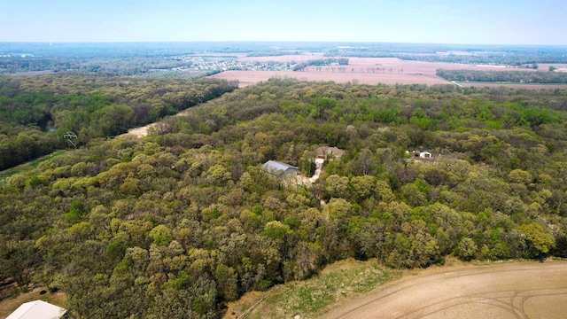 drone / aerial view of a heavily wooded area