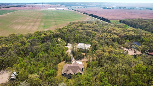 overview of rural landscape with a heavily wooded area