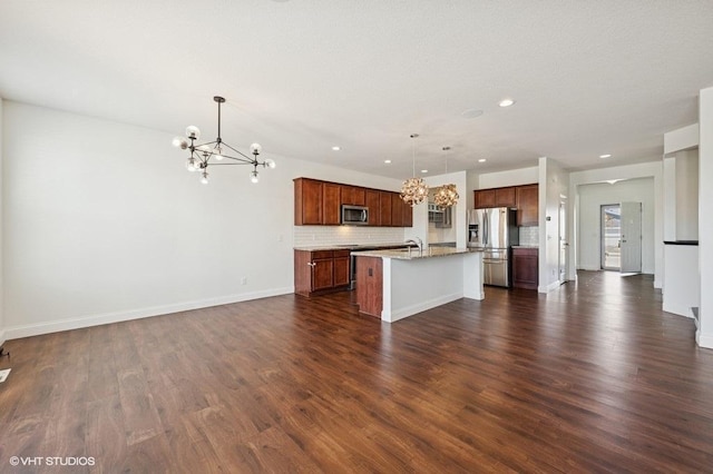 3618 112th Cir NE, Blaine, MN 55449 - kitchen featuring appliances with stainless steel finishes, a chandelier, open floor plan, dark wood-style flooring, and recessed lighting