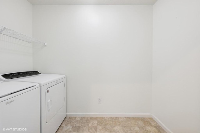 3618 112th Cir NE, Blaine, MN 55449 - laundry area featuring washing machine and dryer and baseboards
