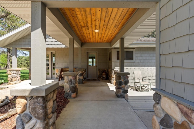 property entrance with a patio