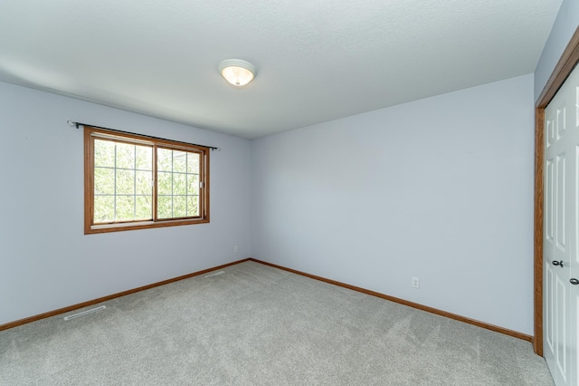 1463 Belvior Ln NE, Byron, MN 55920 - empty room with light colored carpet and baseboards