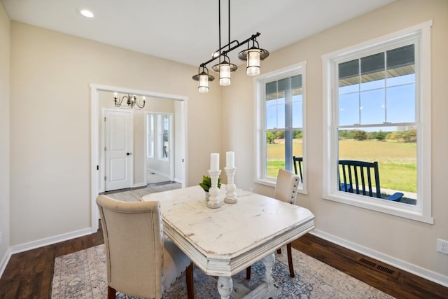 13985 120th St N, Stillwater Twp, MN 55082 - dining space featuring baseboards, dark wood finished floors, recessed lighting, and a chandelier