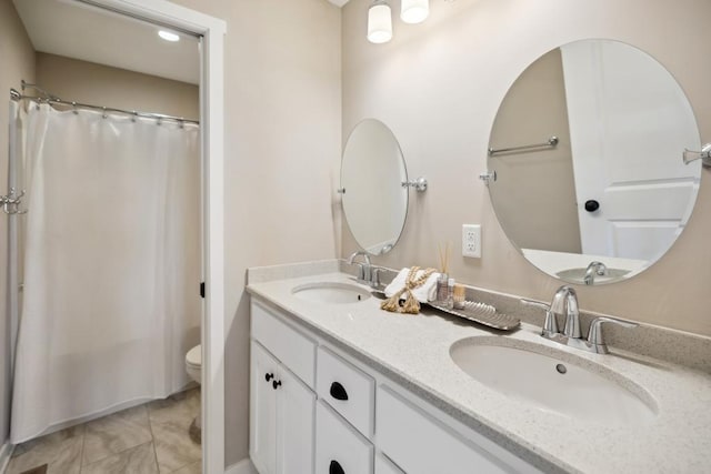 13985 120th St N, Stillwater Twp, MN 55082 - full bathroom featuring toilet, double vanity, and curtained shower