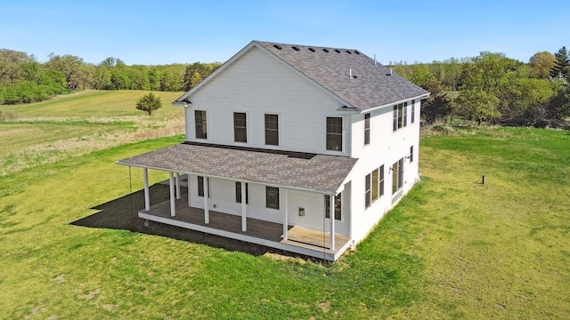 13985 120th St N, Stillwater Twp, MN 55082 - back of house with roof with shingles and a yard