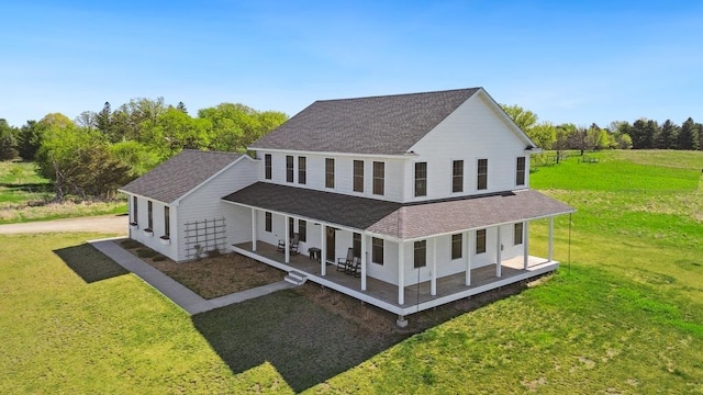 13985 120th St N, Stillwater Twp, MN 55082 - view of side of home with covered porch, roof with shingles, and a yard