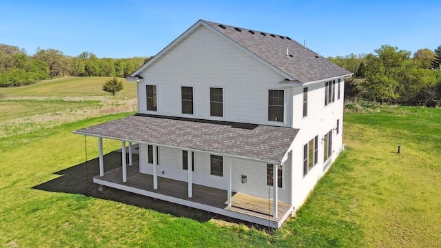 13985 120th St N, Stillwater Twp, MN 55082 - rear view of house with a shingled roof and a lawn