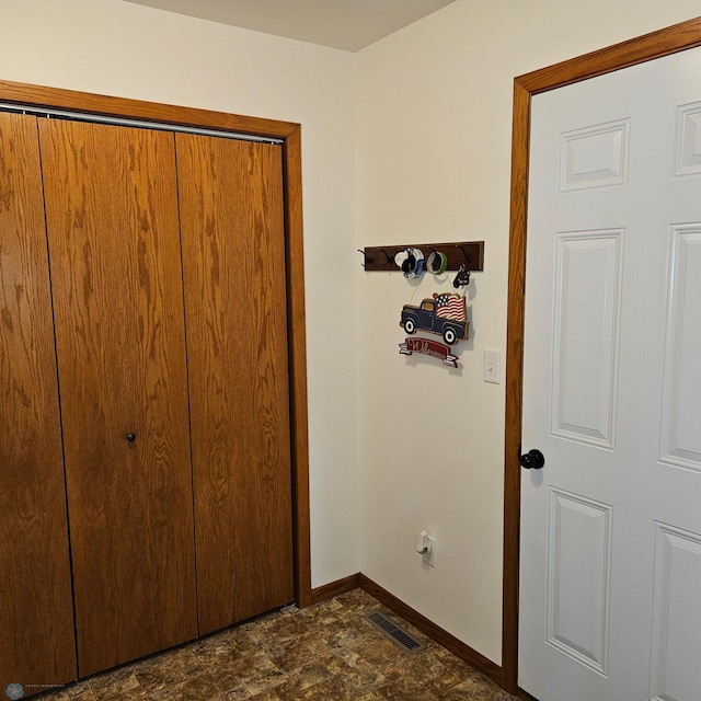 1171 Long Bridge Cir, Detroit Lakes, MN 56501 - hall with baseboards and stone finish floors