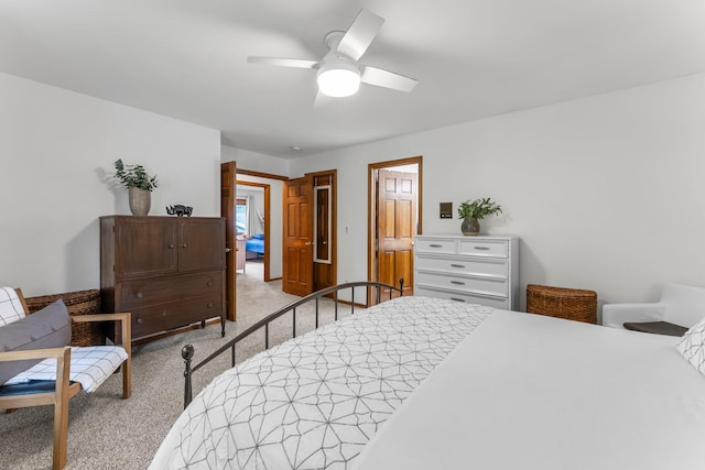 carpeted bedroom featuring a ceiling fan