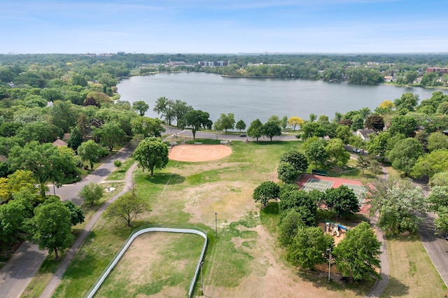 aerial view of property and surrounding area with a large body of water