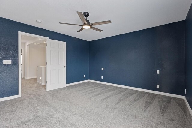 19835 County Road 30, Corcoran, MN 55340 - unfurnished room with a ceiling fan, carpet flooring, baseboards, and a smoke detector