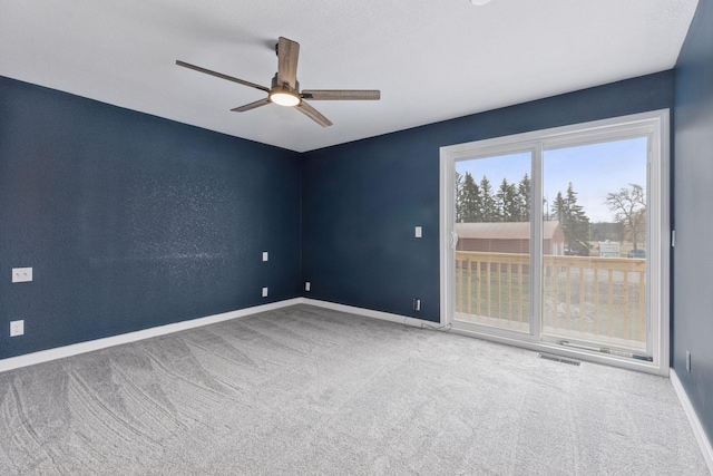 19835 County Road 30, Corcoran, MN 55340 - empty room with carpet floors, a ceiling fan, and baseboards