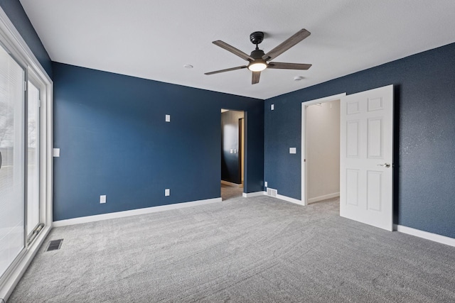 19835 County Road 30, Corcoran, MN 55340 - unfurnished bedroom with carpet, baseboards, and ceiling fan