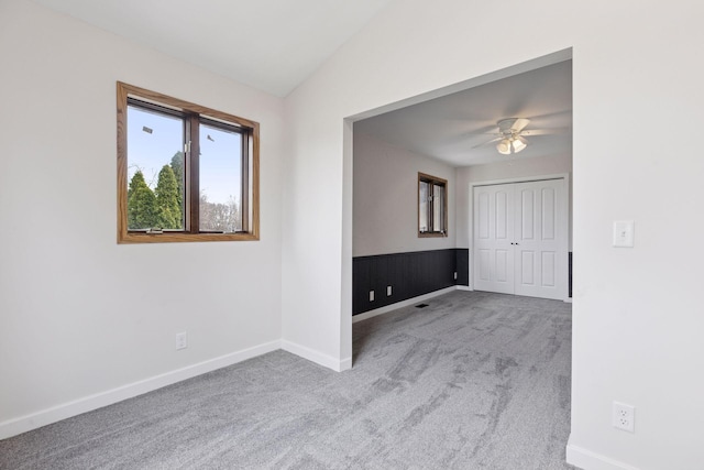 19835 County Road 30, Corcoran, MN 55340 - empty room with carpet, ceiling fan, baseboards, and lofted ceiling