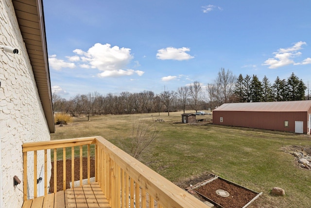 19835 County Road 30, Corcoran, MN 55340 - view of grassy yard with an outdoor structure, a pole building, and a deck