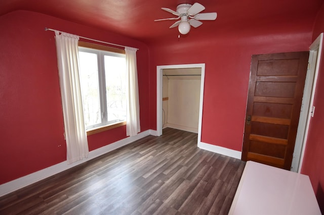 321 1st Ave SW, Baudette, MN 56623 - unfurnished bedroom featuring dark wood finished floors, baseboards, a closet, and ceiling fan