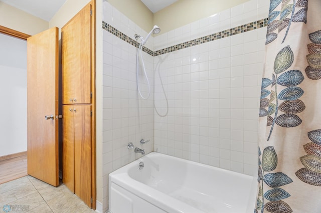 1214 8th St N, Moorhead, MN 56560 - bathroom featuring shower / bath combo and tile patterned flooring