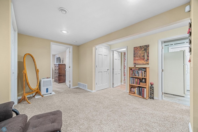 1214 8th St N, Moorhead, MN 56560 - sitting room with carpet floors, baseboards, and recessed lighting