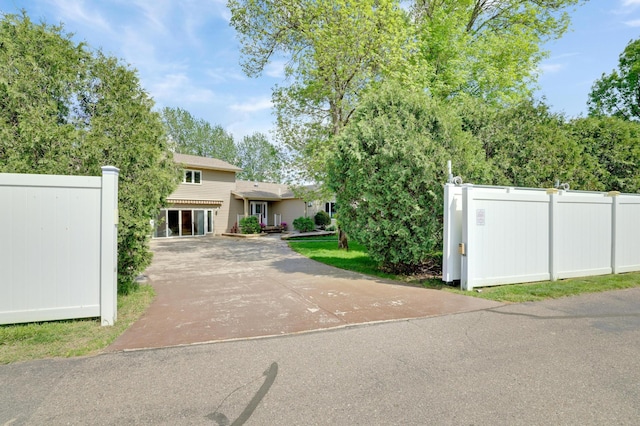 7256 Maciver Ave NE, Otsego, MN 55301 - view of front of house with concrete driveway