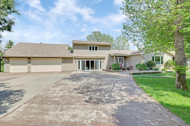 7256 Maciver Ave NE, Otsego, MN 55301 - traditional-style home featuring concrete driveway, an attached garage, and a front yard