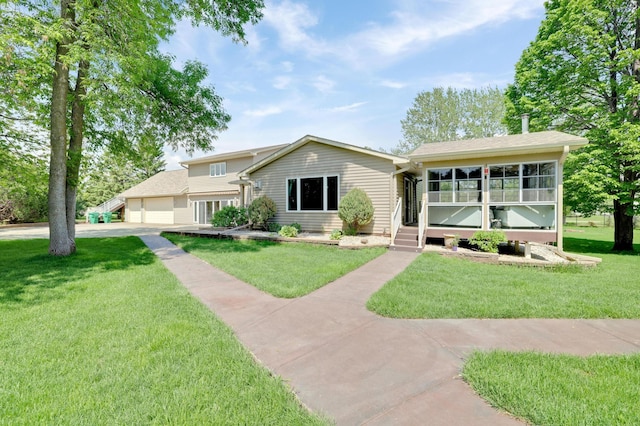 7256 Maciver Ave NE, Otsego, MN 55301 - view of front of property featuring a front yard, driveway, and an attached garage