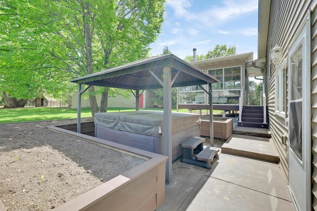 7256 Maciver Ave NE, Otsego, MN 55301 - fenced backyard with a hot tub, a gazebo, and a patio area