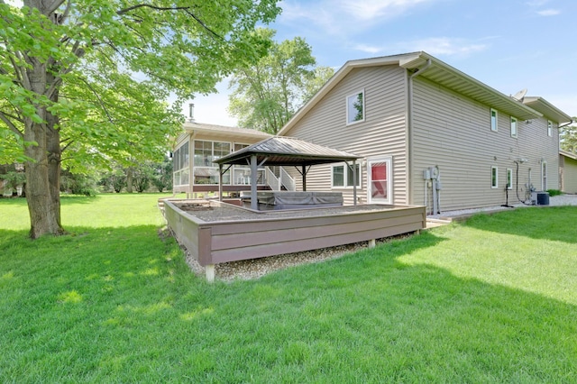 7256 Maciver Ave NE, Otsego, MN 55301 - rear view of property with a gazebo, central AC unit, and a lawn