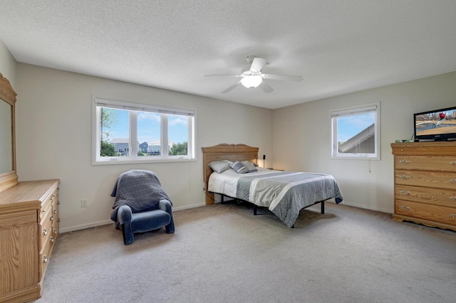7256 Maciver Ave NE, Otsego, MN 55301 - bedroom with carpet flooring, a ceiling fan, and baseboards