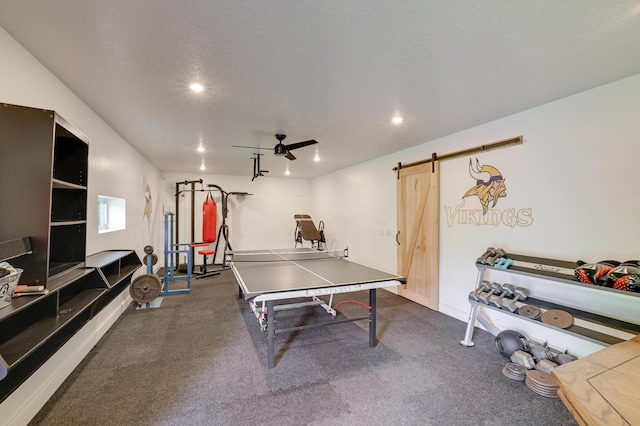 7256 Maciver Ave NE, Otsego, MN 55301 - game room with a barn door, a ceiling fan, recessed lighting, and baseboards