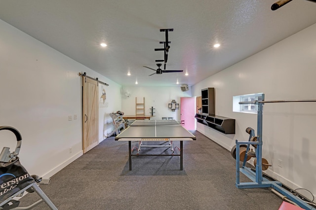 7256 Maciver Ave NE, Otsego, MN 55301 - rec room with a barn door, recessed lighting, a ceiling fan, and baseboards