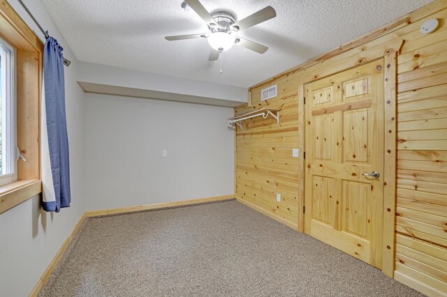 7256 Maciver Ave NE, Otsego, MN 55301 - spacious closet featuring carpet flooring and ceiling fan