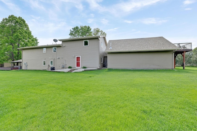7256 Maciver Ave NE, Otsego, MN 55301 - back of property with a yard and a wooden deck