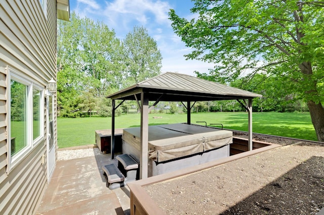 7256 Maciver Ave NE, Otsego, MN 55301 - view of patio featuring a hot tub and a gazebo