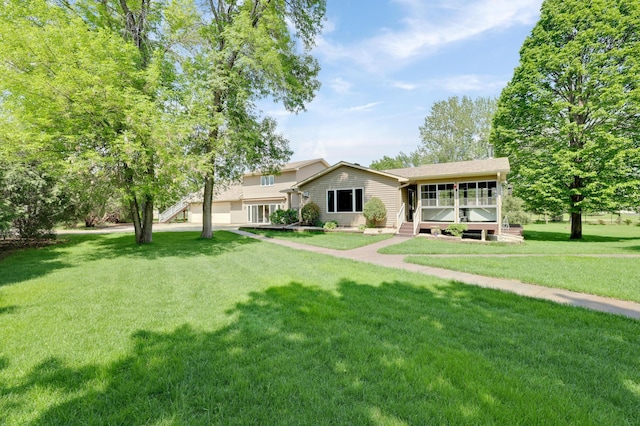 7256 Maciver Ave NE, Otsego, MN 55301 - view of front facade with a front lawn and a sunroom
