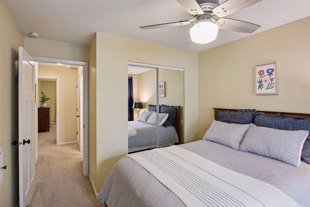 1623 Black Oaks Pl N, Plymouth, MN 55447 - bedroom featuring light colored carpet, a closet, and ceiling fan