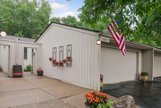 1623 Black Oaks Pl N, Plymouth, MN 55447 - garage featuring asphalt driveway