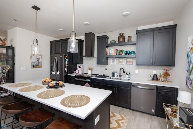 kitchen with stainless steel dishwasher, wall chimney range hood, black electric range oven, a sink, and fridge with ice dispenser
