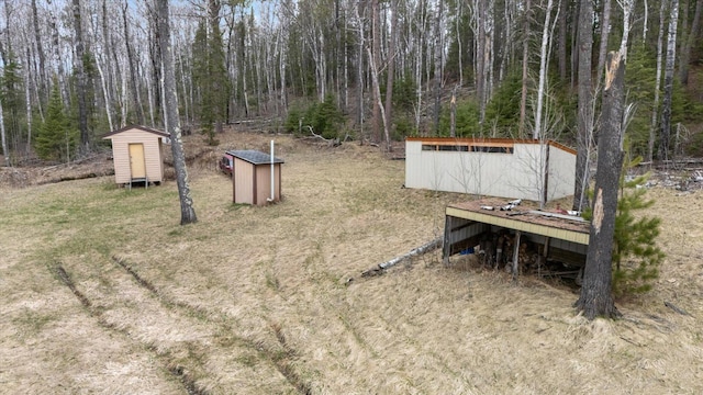 6301 Hunters Pass, Greenwood Twp, MN 55790 - view of yard with a shed and an outdoor structure