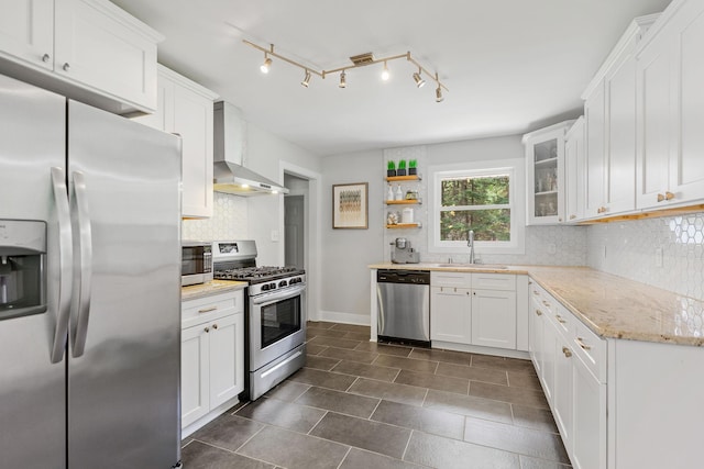 1354 Judith Ave, Roseville, MN 55113 - kitchen with stainless steel appliances, wall chimney exhaust hood, a sink, and white cabinetry