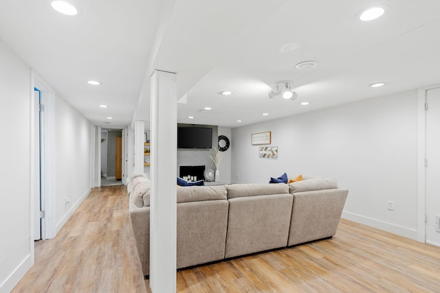 1354 Judith Ave, Roseville, MN 55113 - living room with a fireplace, light wood-type flooring, baseboards, and recessed lighting