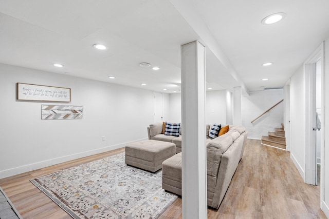 1354 Judith Ave, Roseville, MN 55113 - living area featuring light wood-type flooring, stairs, baseboards, and recessed lighting