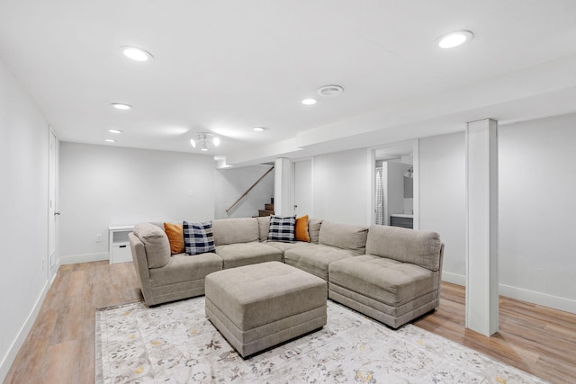 1354 Judith Ave, Roseville, MN 55113 - living area with baseboards, wood finished floors, stairway, and recessed lighting