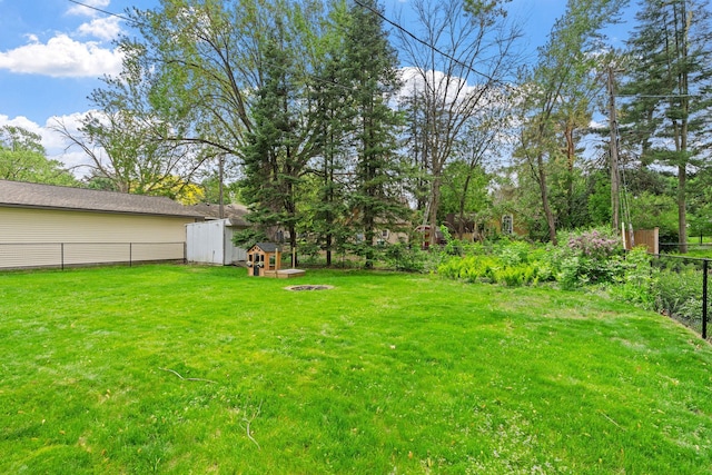 1354 Judith Ave, Roseville, MN 55113 - view of yard featuring an outdoor fire pit