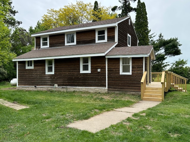 46130 Anchor Ave, Fish Lake Twp, MN 55080 - view of home's exterior featuring a yard and roof with shingles