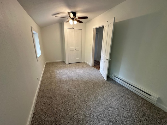 46130 Anchor Ave, Fish Lake Twp, MN 55080 - unfurnished bedroom with a baseboard heating unit, carpet floors, a closet, ceiling fan, and baseboards
