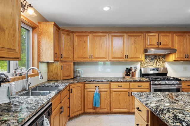 15777 Grover Ave NW, Clearwater Twp, MN 55320 - kitchen featuring gas stove, under cabinet range hood, a sink, plenty of natural light, and recessed lighting