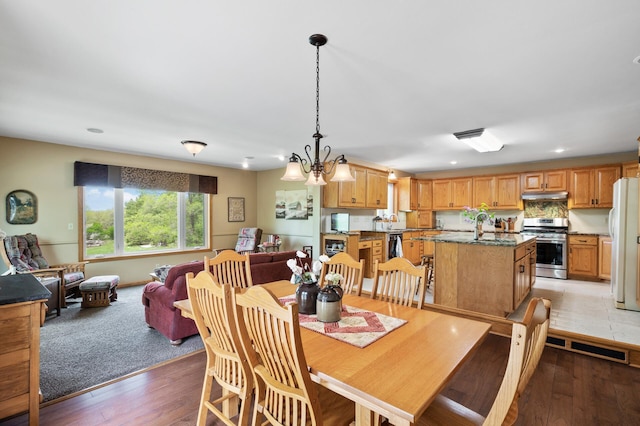 15777 Grover Ave NW, Clearwater Twp, MN 55320 - dining space featuring light wood-type flooring, recessed lighting, and a chandelier