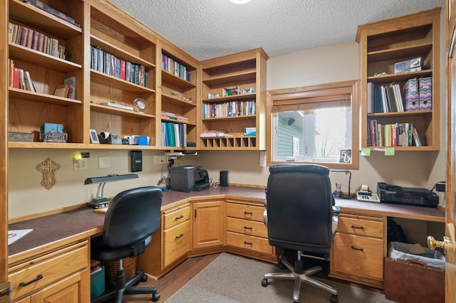 15777 Grover Ave NW, Clearwater Twp, MN 55320 - office space featuring built in study area, dark wood-type flooring, and a textured ceiling