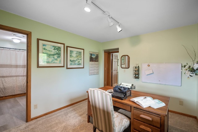 15777 Grover Ave NW, Clearwater Twp, MN 55320 - office area featuring carpet floors, baseboards, and track lighting